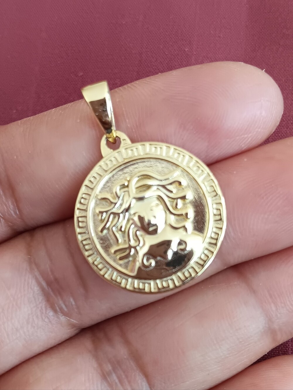 Gold Medusa-Style Round Pendant.
